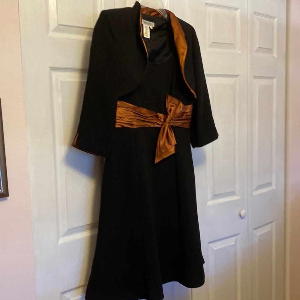 38" shoulder strap to slightly flared hem. 17" underarms. 16" waist.